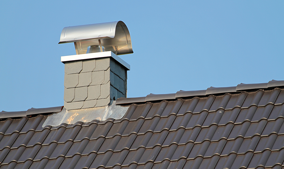 Newly restored rooftop chimney after repair